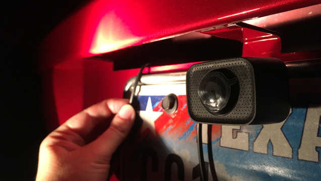 Routing the cord for the back-up camera.
